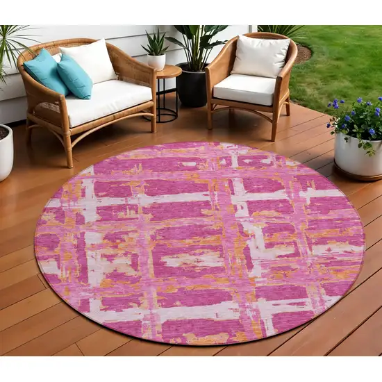 8' Blush Pink And Orange Round Striped Washable Indoor Outdoor Area Rug Photo 1
