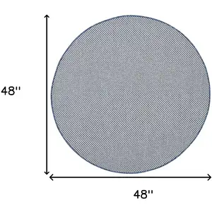Photo of 4' Bone Round Geometric Power Loom Area Rug