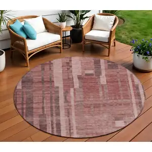 Photo of 8' Brick Red And Brown Round Striped Washable Indoor Outdoor Area Rug