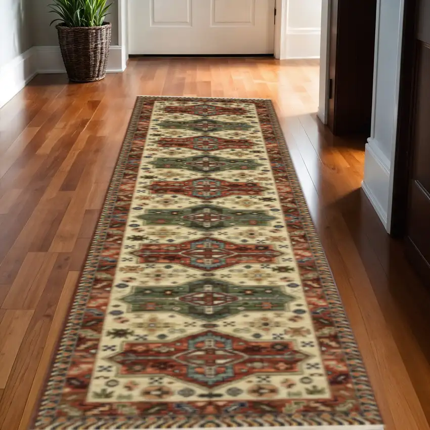 12' Red and Ivory Oriental Power Loom Runner Rug Photo 1