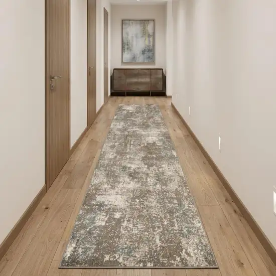 10' Ivory Brown And Green Abstract Runner Rug Photo 1