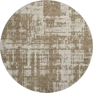 Photo of 8' Brown And Beige Abstract Washable Round Rug With UV Protection