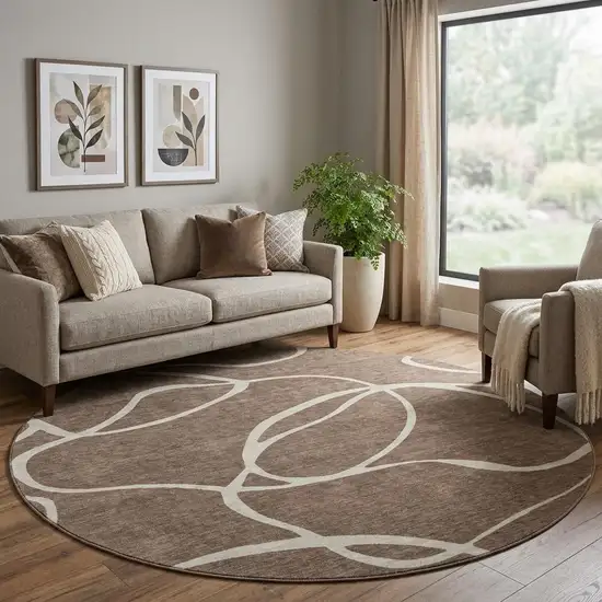 8' Brown And Beige Abstract Washable Round Rug With UV Protection Photo 1