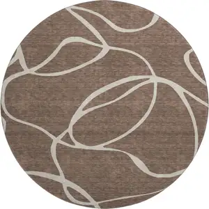 Photo of 8' Brown And Beige Abstract Washable Round Rug With UV Protection