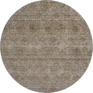 Photo of 8' Brown And Beige Abstract Washable Round Rug With UV Protection