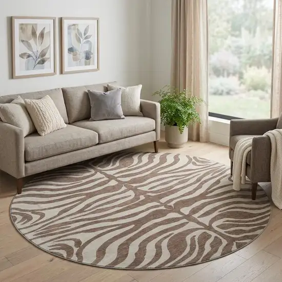 8' Brown And Beige Animal Print Washable Round Rug With UV Protection Photo 1