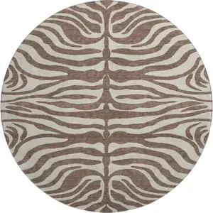 Photo of 8' Brown And Beige Animal Print Washable Round Rug With UV Protection