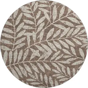 Photo of 8' Brown And Beige Floral Washable Round Rug With UV Protection