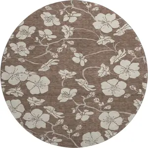 Photo of 8' Brown And Beige Floral Washable Round Rug With UV Protection