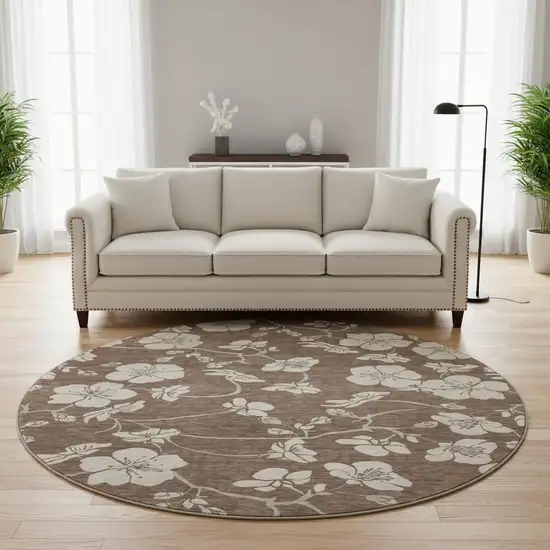 8' Brown And Beige Floral Washable Round Rug With UV Protection Photo 2