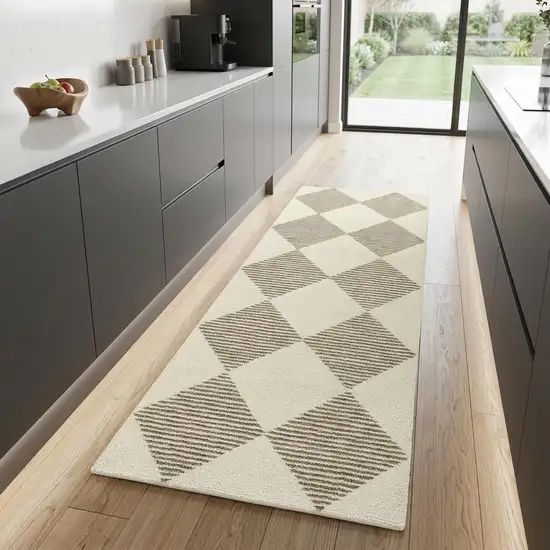 8' Brown And Beige Geometric Runner Rug Photo 1