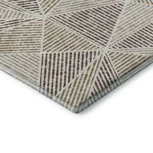 Photo of 8' Brown And Beige Geometric Washable Round Rug With UV Protection