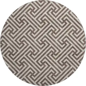 Photo of 8' Brown And Beige Geometric Washable Round Rug With UV Protection