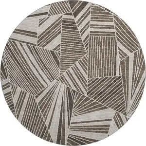 Photo of 8' Brown And Beige Geometric Washable Round Rug With UV Protection