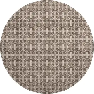 Photo of 8' Brown And Beige Geometric Washable Round Rug With UV Protection