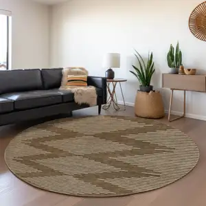 Photo of 8' Brown And Beige Geometric Washable Round Rug With UV Protection