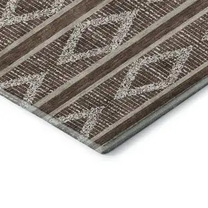 Photo of 8' Brown And Beige Geometric Washable Round Rug With UV Protection