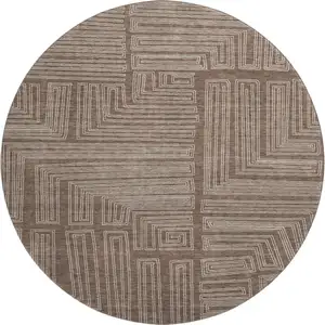 Photo of 8' Brown And Beige Geometric Washable Round Rug With UV Protection
