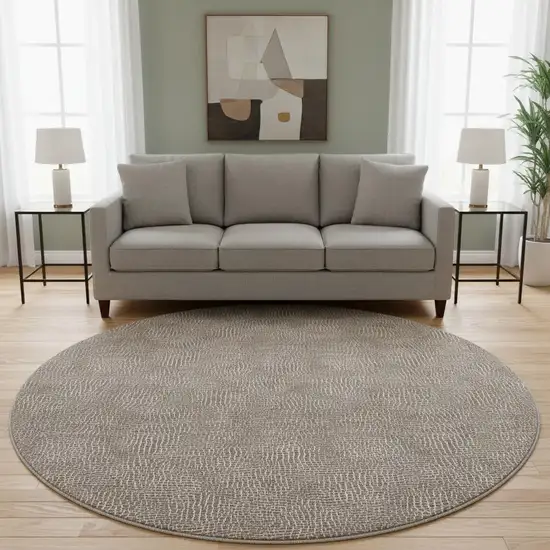 8' Brown And Beige Geometric Washable Round Rug With UV Protection Photo 2