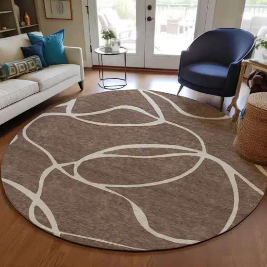 8' Brown And Beige Round Abstract Washable Indoor Outdoor Area Rug Photo 8