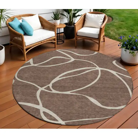 8' Brown And Beige Round Abstract Washable Indoor Outdoor Area Rug Photo 1
