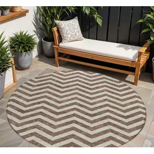 Photo of 8' Brown And Beige Round Chevron Washable Indoor Outdoor Area Rug
