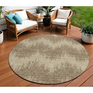 Photo of 8' Brown And Beige Round Chevron Washable Indoor Outdoor Area Rug