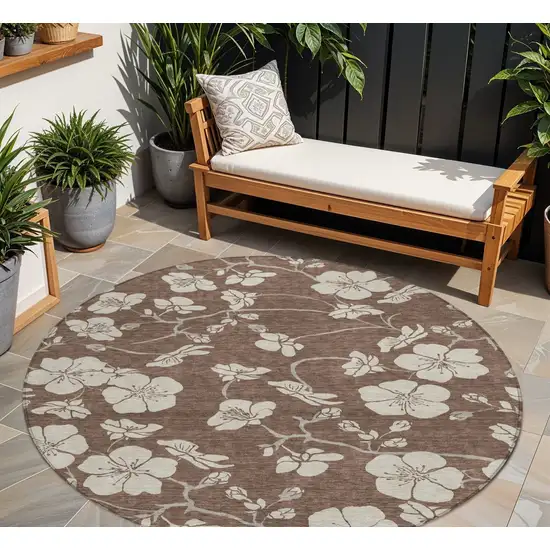 8' Brown And Beige Round Floral Washable Indoor Outdoor Area Rug Photo 1
