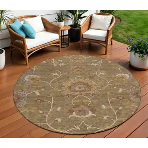 Photo of 8' Brown And Beige Round Floral Washable Indoor Outdoor Area Rug