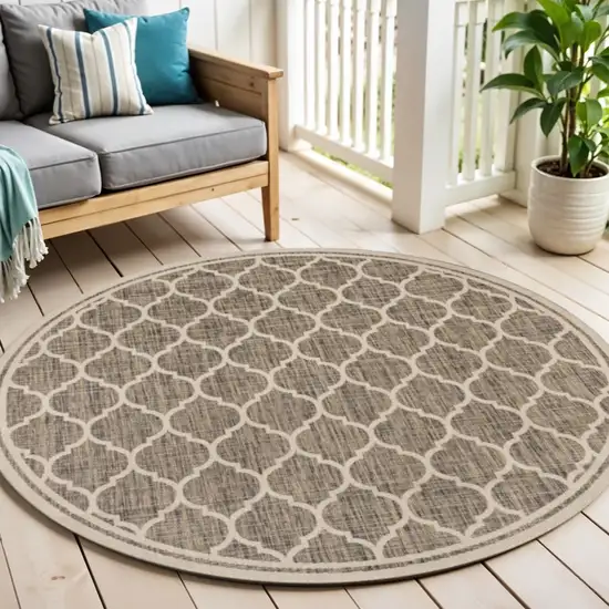 6' Brown And Beige Round Geometric Indoor Outdoor Area Rug Photo 1