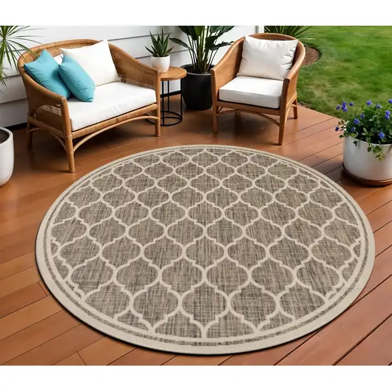 9' Brown And Beige Round Geometric Indoor Outdoor Area Rug Photo 1