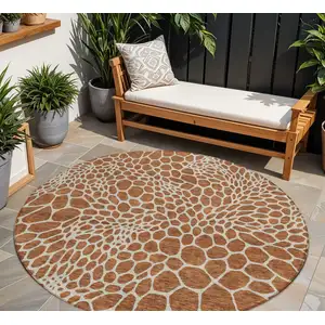 Photo of 8' Brown And Beige Round Geometric Washable Indoor Outdoor Area Rug
