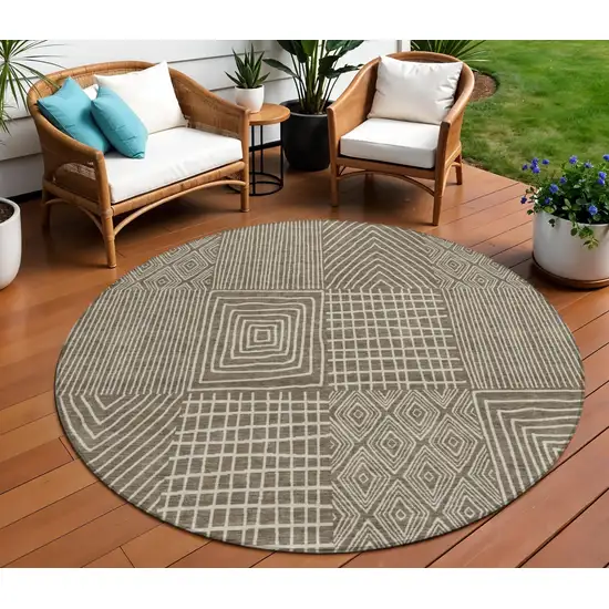 8' Brown And Beige Round Geometric Washable Indoor Outdoor Area Rug Photo 1