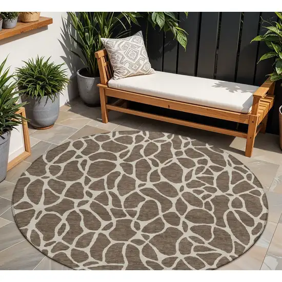 8' Brown And Beige Round Geometric Washable Indoor Outdoor Area Rug Photo 1