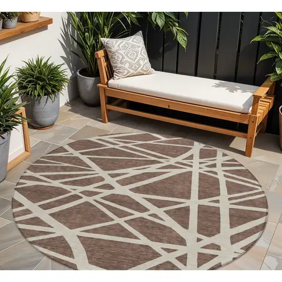 8' Brown And Beige Round Geometric Washable Indoor Outdoor Area Rug Photo 1