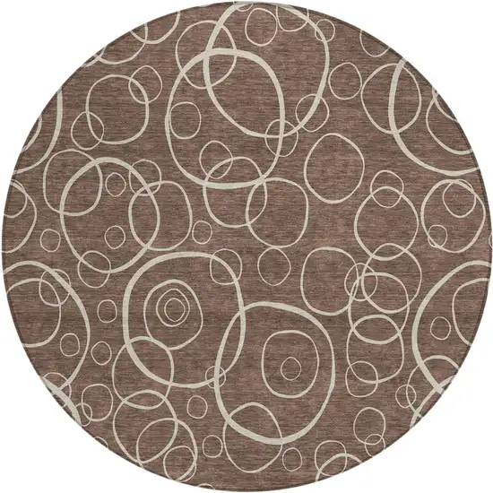 8' Brown And Beige Round Geometric Washable Indoor Outdoor Area Rug Photo 1