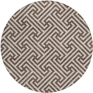 Photo of 8' Brown And Beige Round Geometric Washable Indoor Outdoor Area Rug