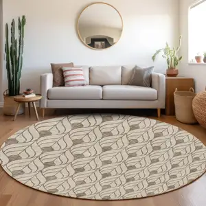 Photo of 8' Brown And Beige Round Geometric Washable Indoor Outdoor Area Rug