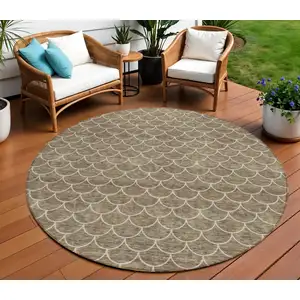 Photo of 8' Brown And Beige Round Geometric Washable Indoor Outdoor Area Rug