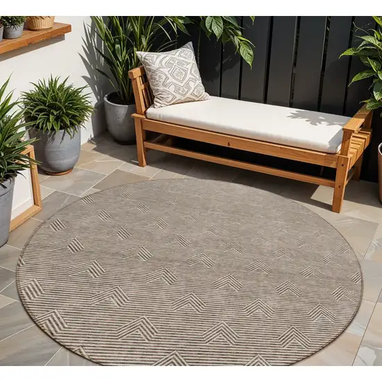 8' Brown And Beige Round Geometric Washable Indoor Outdoor Area Rug Photo 1