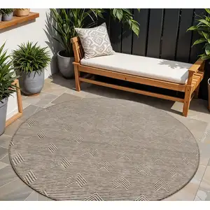 Photo of 8' Brown And Beige Round Geometric Washable Indoor Outdoor Area Rug