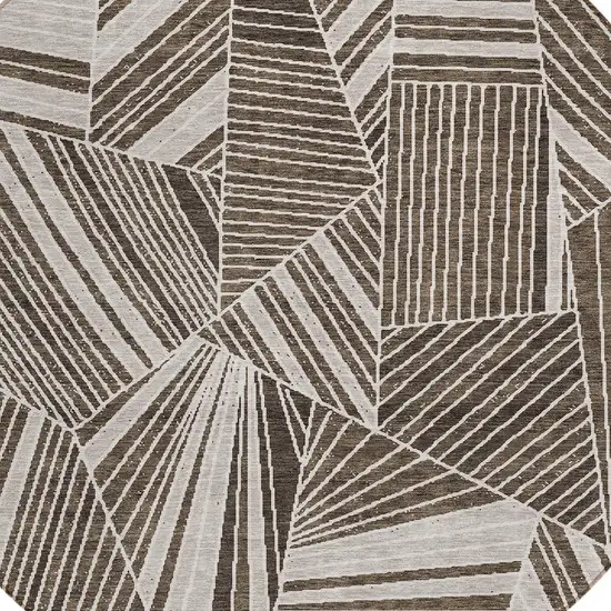 8' Brown And Beige Round Geometric Washable Indoor Outdoor Area Rug Photo 4