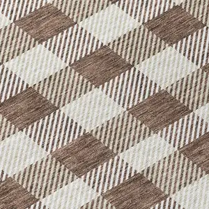 Photo of 8' Brown And Beige Round Plaid Washable Indoor Outdoor Area Rug