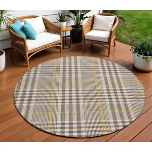 Photo of 8' Brown And Beige Round Plaid Washable Indoor Outdoor Area Rug