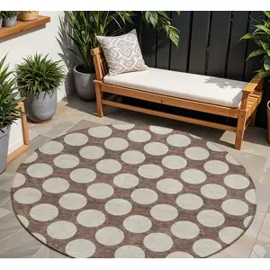 Photo of 8' Brown And Beige Round Polka Dot Washable Indoor Outdoor Area Rug