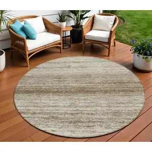 Photo of 8' Brown And Beige Round Striped Washable Indoor Outdoor Area Rug