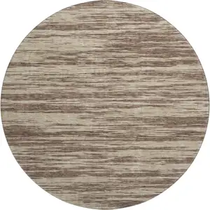 Photo of 8' Brown And Beige Striped Washable Round Rug With UV Protection