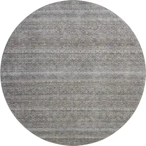 Photo of 8' Brown And Beige Striped Washable Round Rug With UV Protection