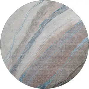Photo of 8' Brown And Blue Abstract Washable Round Rug With UV Protection