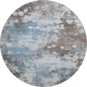 Photo of 8' Brown And Blue Abstract Washable Round Rug With UV Protection